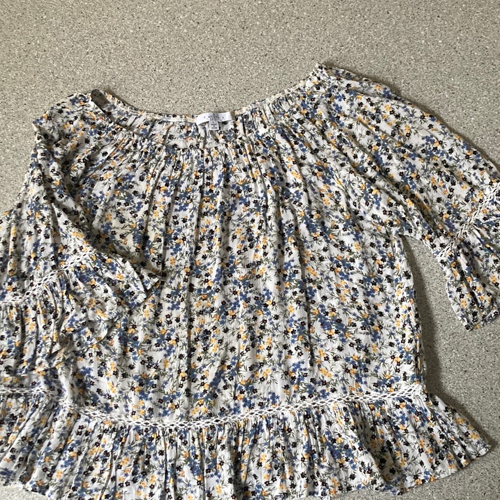 Fever floral peasant top 1/2length sleeves. Cream W/blue, yellow & black.